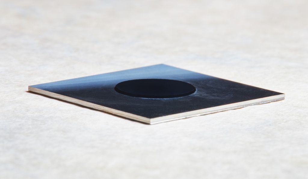 The black carbon nanotubes make up the panel's absorber-emitter layer. (MIT)